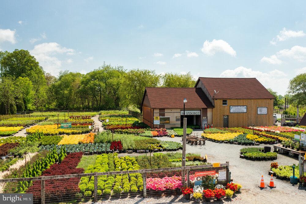 430 Limestone Road Oxford, PA 19363 - Photo 10 of 20 a view of a house with swimming pool and chairs