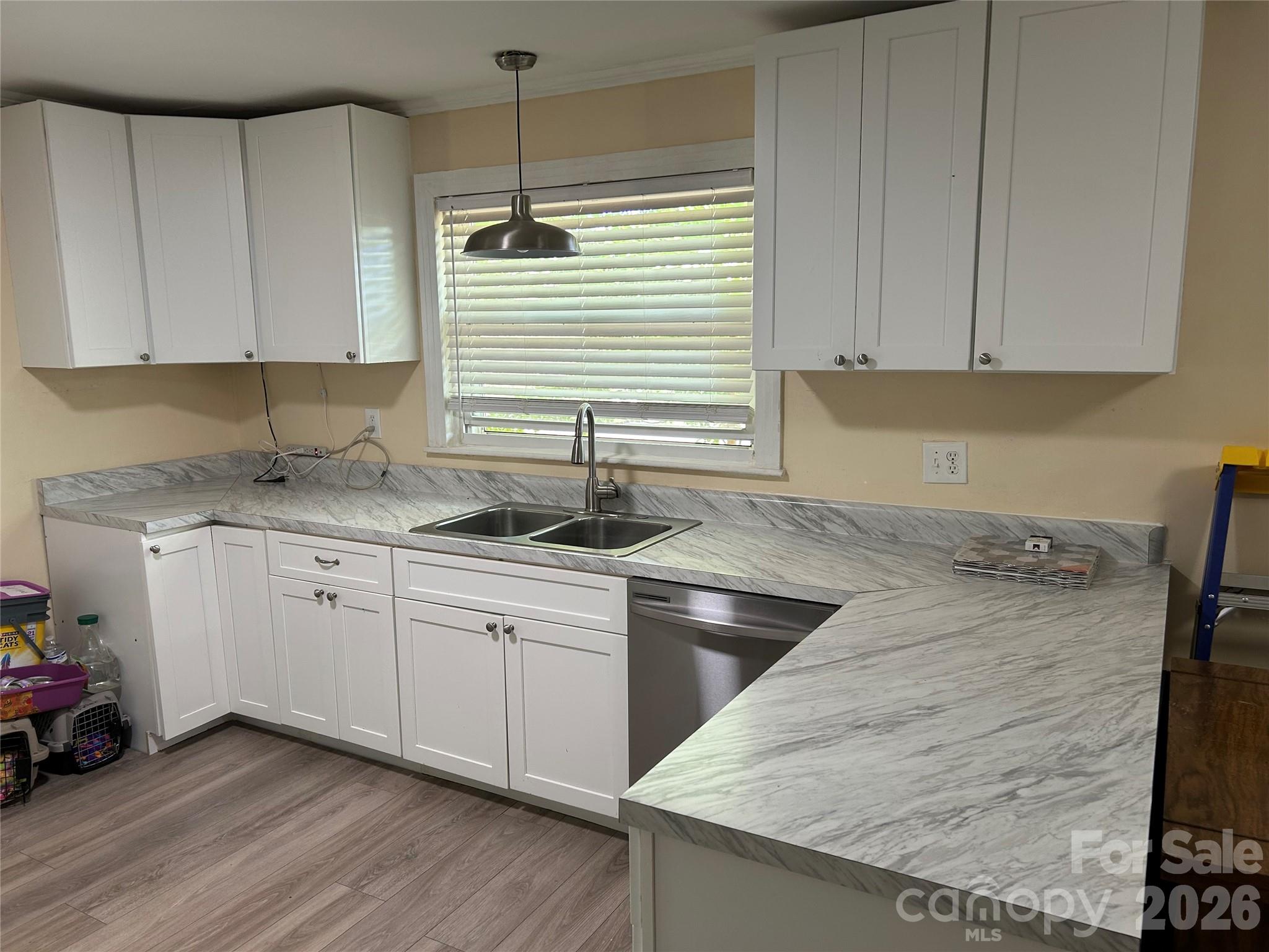 2307 Harris Henrietta Road Forest City, NC 28043 - Photo 12 of 31 a kitchen with a sink stove and cabinets