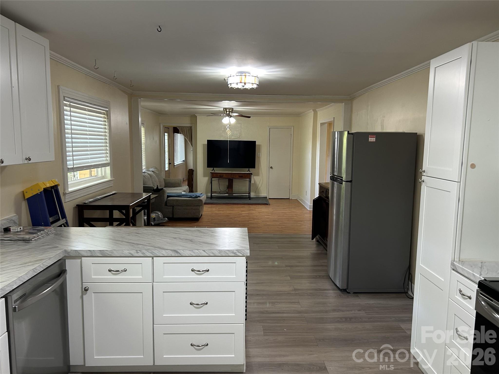 2307 Harris Henrietta Road Forest City, NC 28043 - Photo 13 of 31 a kitchen with a refrigerator and a sink