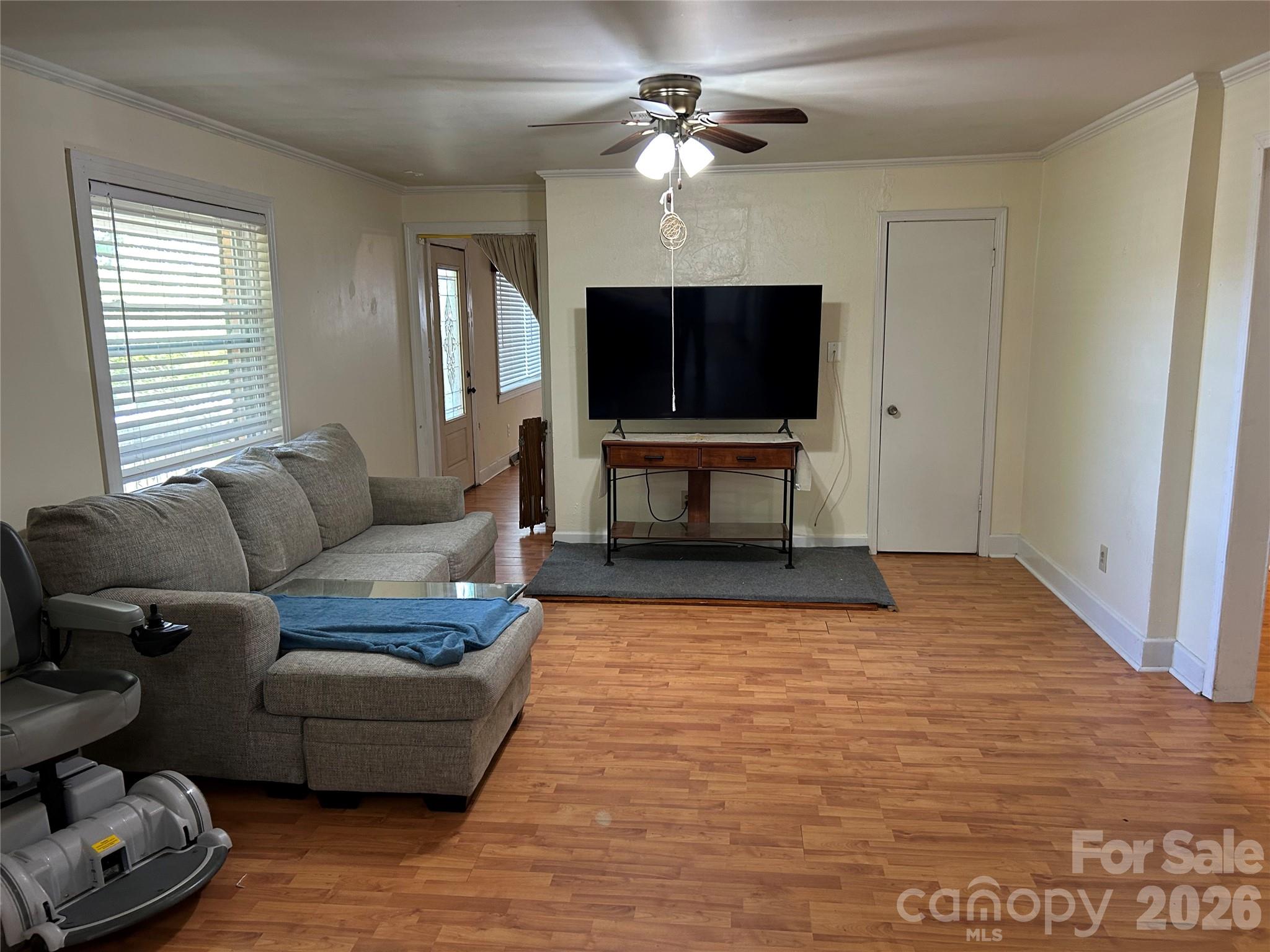 2307 Harris Henrietta Road Forest City, NC 28043 - Photo 15 of 31 a living room with furniture and a flat screen tv