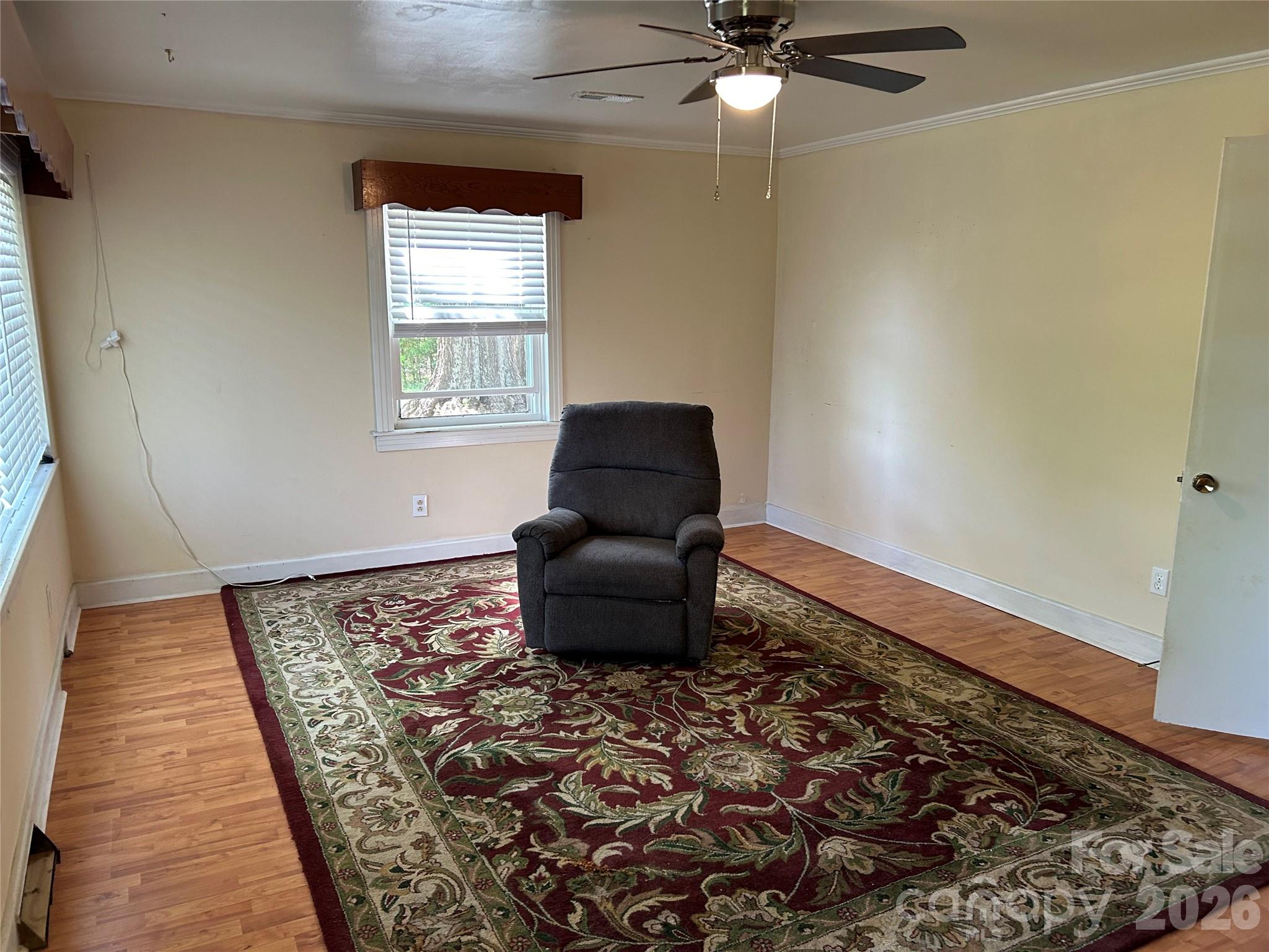 2307 Harris Henrietta Road Forest City, NC 28043 - Photo 18 of 31 a living room with a couch and a rug