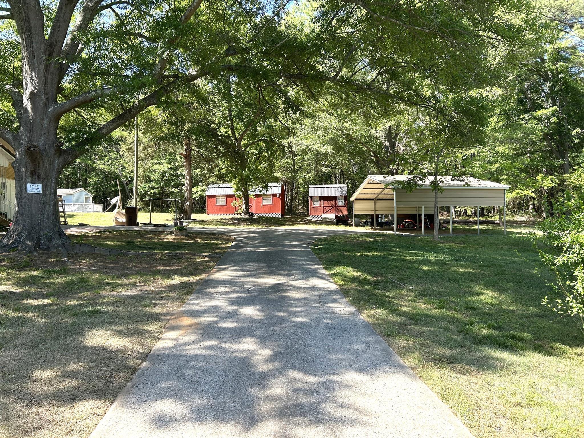 2307 Harris Henrietta Road Forest City, NC 28043 - Photo 5 of 31 a view of a house with a yard