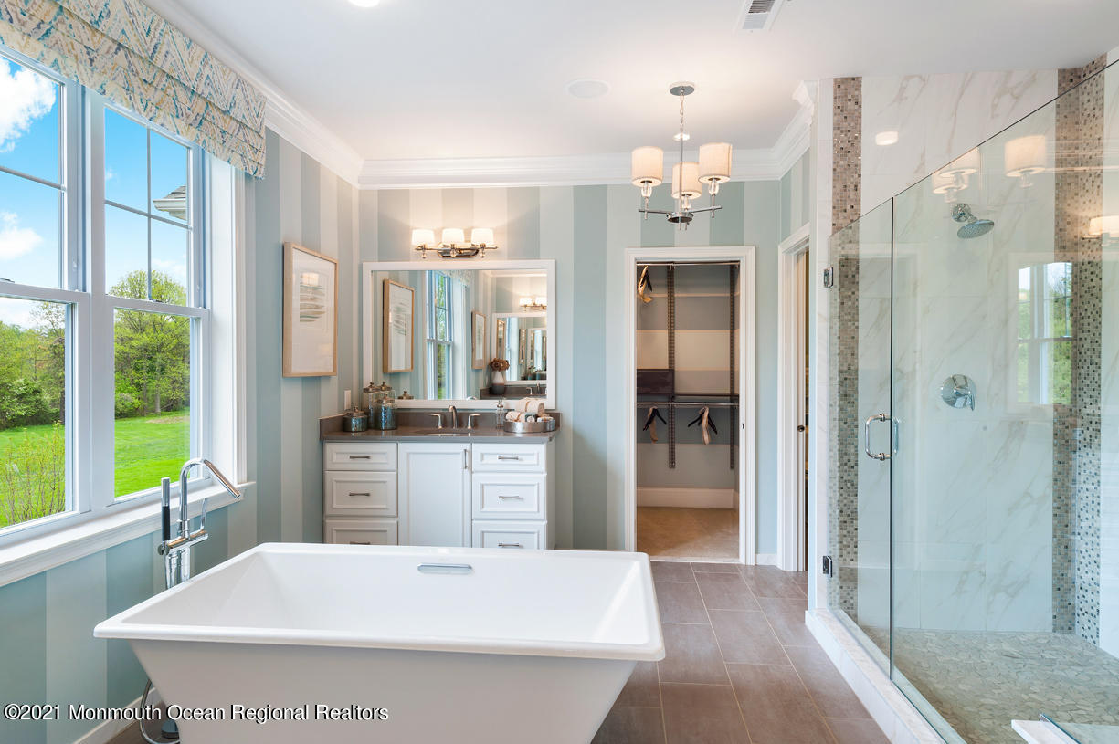 6 Strathmore Road Lincroft, NJ 07738 - Photo 3 of 5 a large white kitchen with a large window