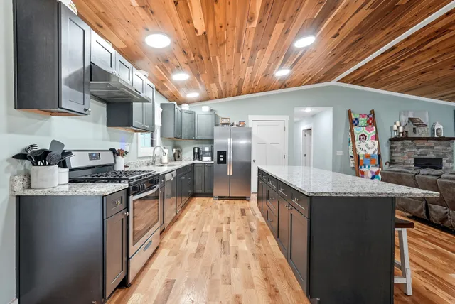 a bathroom with a toilet sink and shower