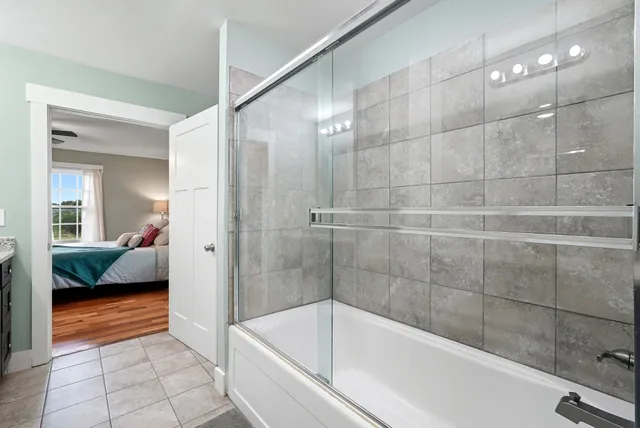 a view of a green field with lots of bushes