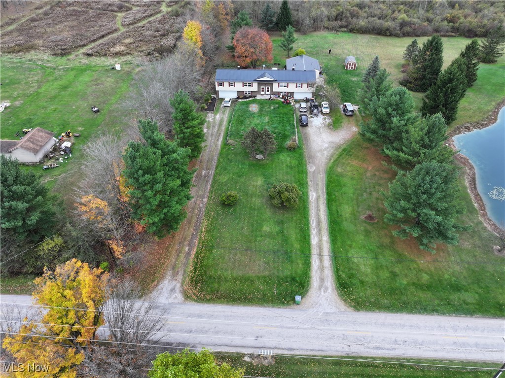 6370 Trumbull Road Geneva, OH 44041 - Photo 45 of 50 Aerial view of property and surrounding area featuring a large body of water
