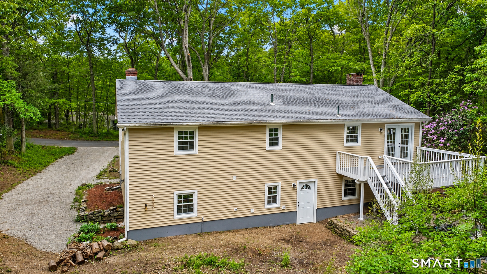 20 Quiet Woods Road East Hampton, CT 06424 - Photo 38 of 40 a aerial view of a house with a yard and plants