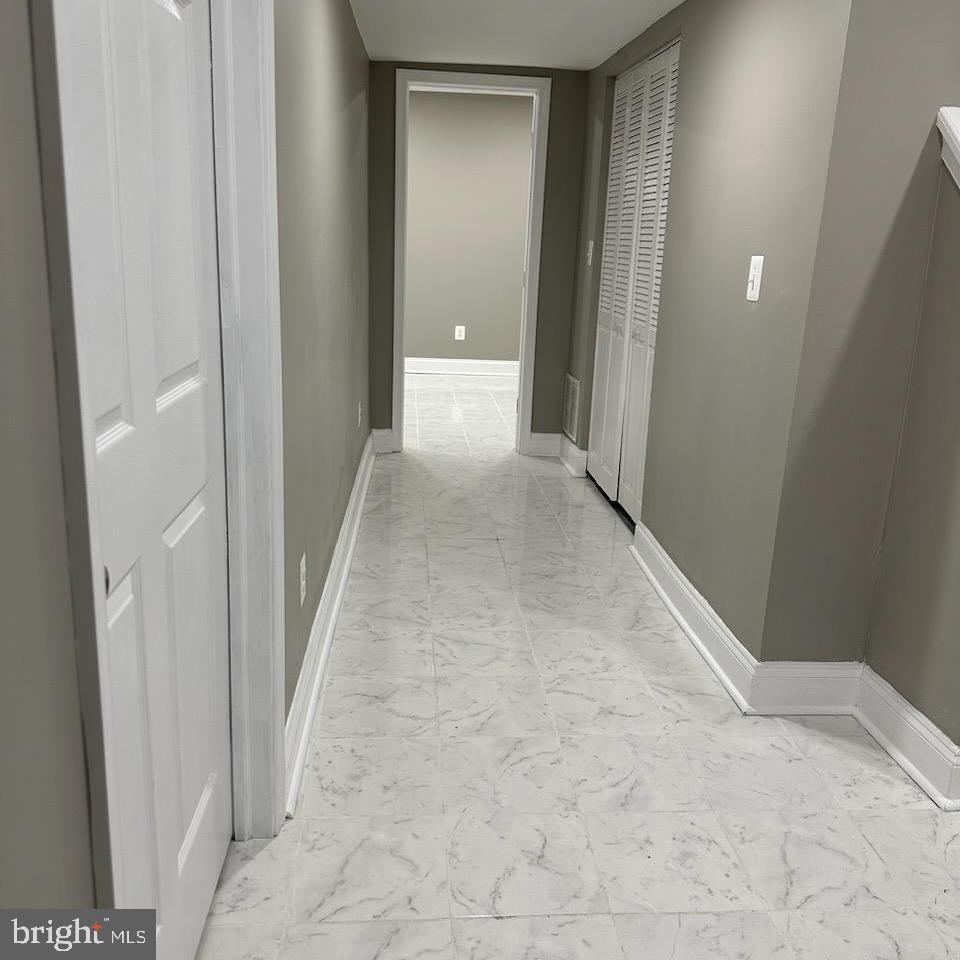 1216 Valley Street Baltimore, MD 21202 - Photo 13 of 21 Basement Hallway