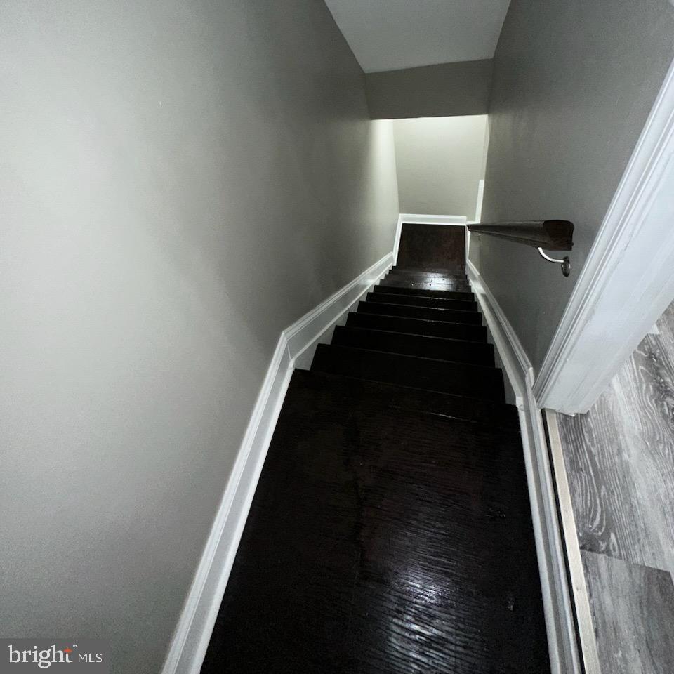 1216 Valley Street Baltimore, MD 21202 - Photo 14 of 21 Basement Staircase