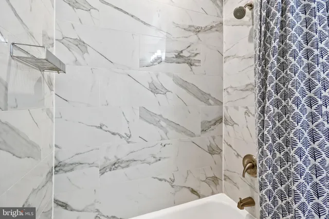 a bathroom with a bathtub