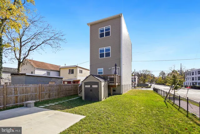 a view of a backyard of the house