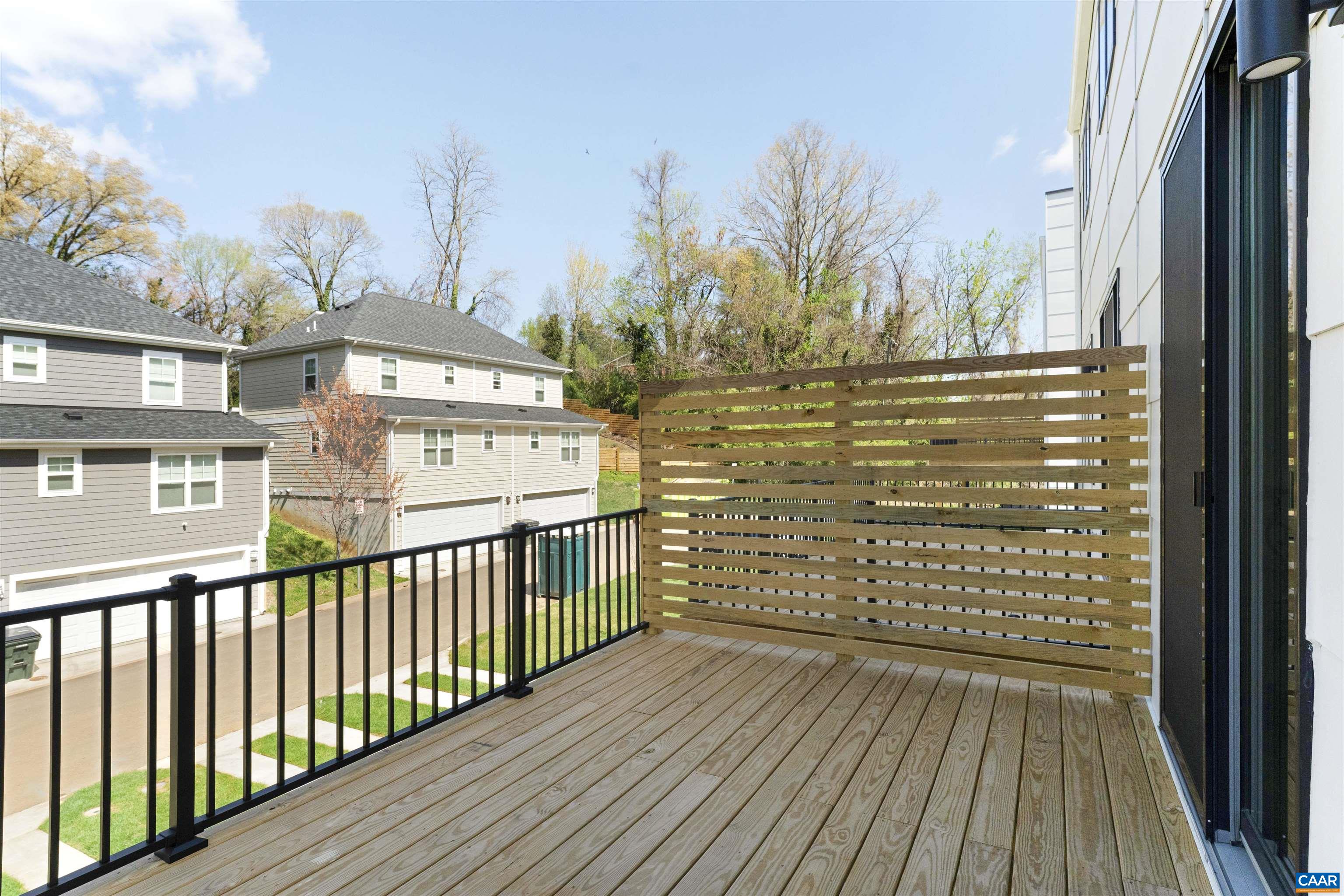 987 5th Street Southwest Charlottesville, VA 22903 - Photo 15 of 33 a view of a balcony with wooden floor