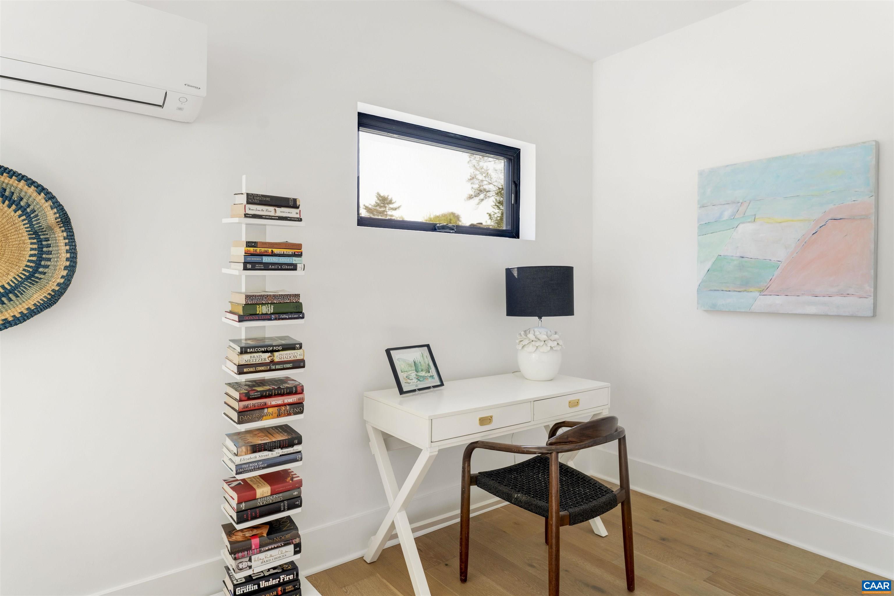 987 5th Street Southwest Charlottesville, VA 22903 - Photo 28 of 33 a dining room with furniture and wooden floor
