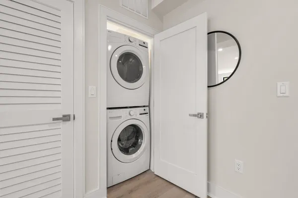 a utility room with dryer and washer