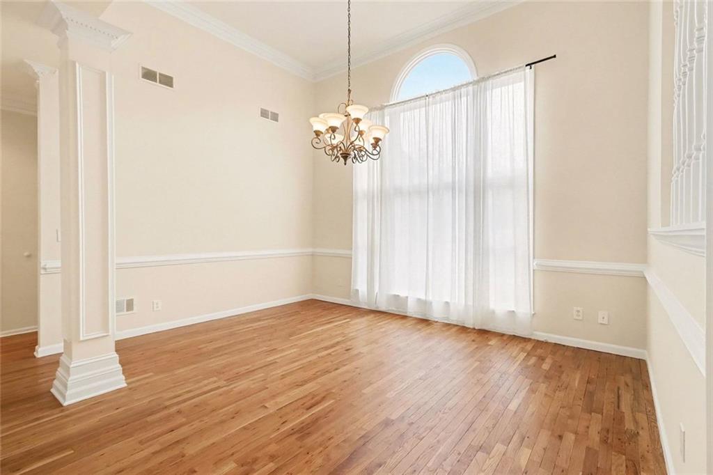 3124 Sherwood Oaks Lane Decatur, GA 30034 - Photo 12 of 41 a view of a room with wooden floor and a ceiling fan