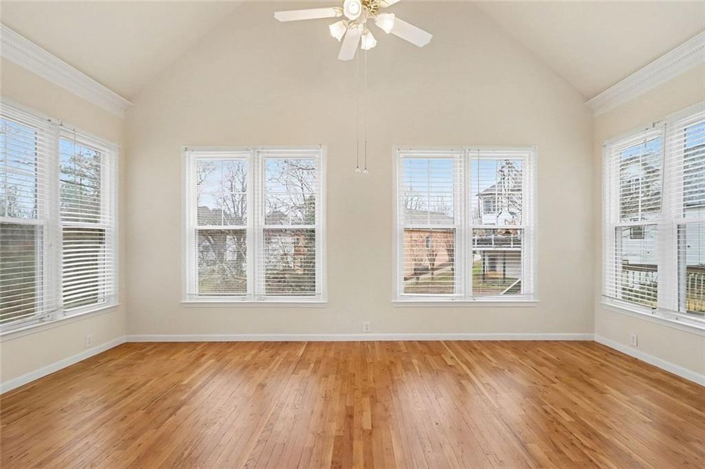 3124 Sherwood Oaks Lane Decatur, GA 30034 - Photo 14 of 41 a view of an empty room with a window and wooden floor