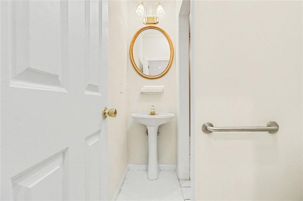 3124 Sherwood Oaks Lane Decatur, GA 30034 - Photo 19 of 41 a bathroom with a sink a mirror and a shower