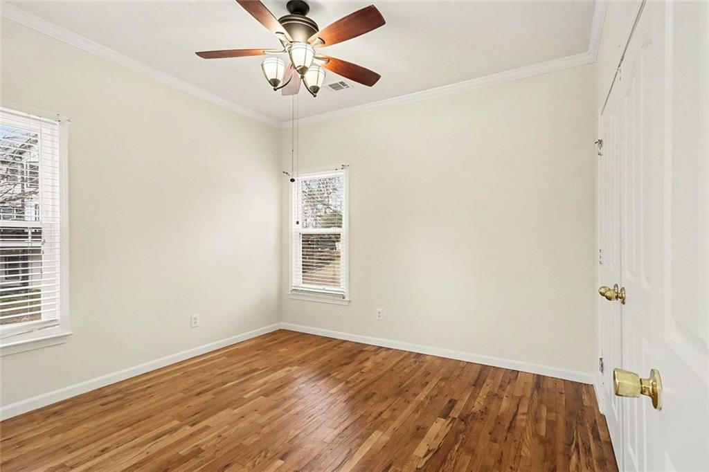 3124 Sherwood Oaks Lane Decatur, GA 30034 - Photo 25 of 41 wooden floor in an empty room with a window