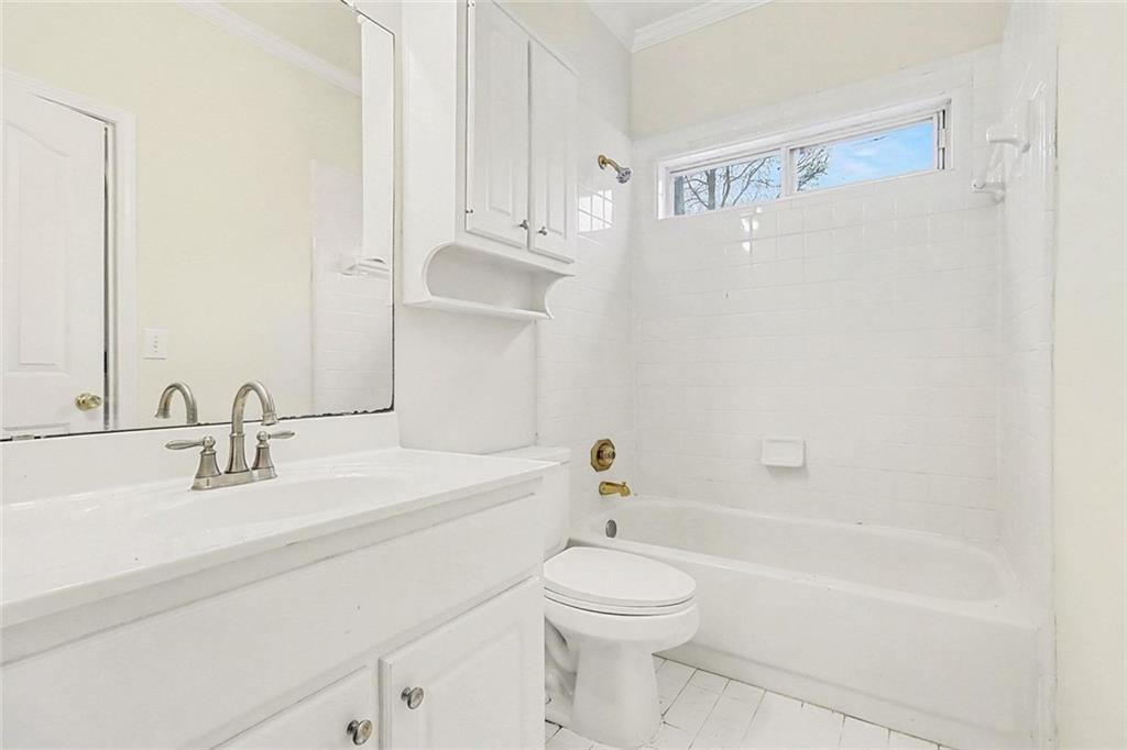 3124 Sherwood Oaks Lane Decatur, GA 30034 - Photo 26 of 41 a bathroom with a sink a toilet and a bathtub