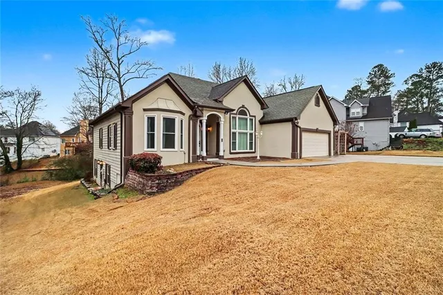 a house with trees in the background
