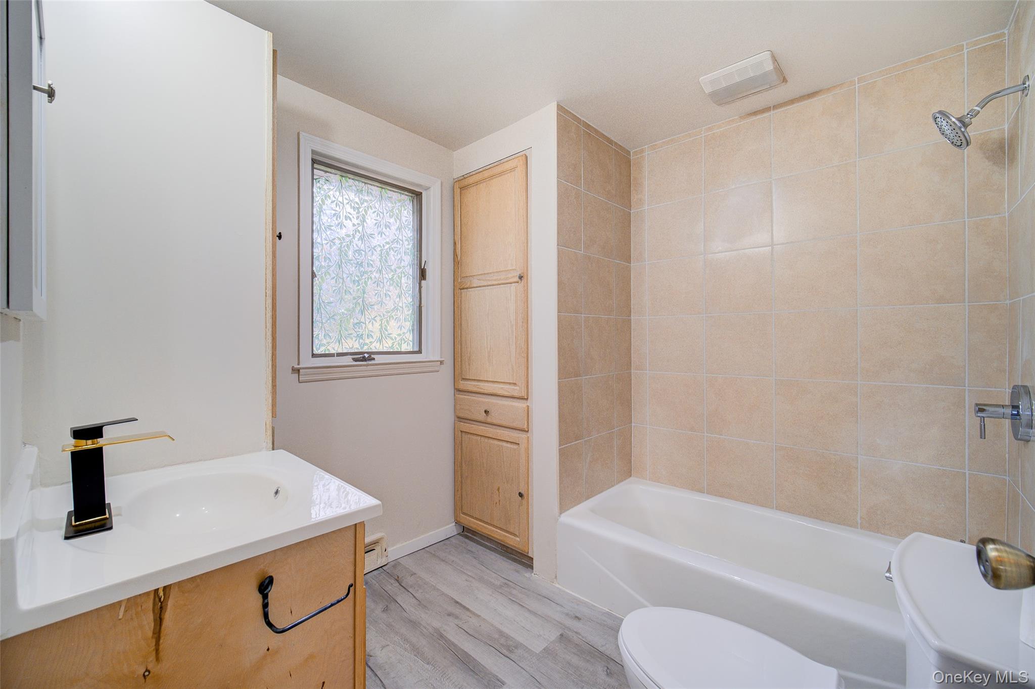 17 Baldwin Road Carmel, NY 10512 - Photo 21 of 29 a bathroom with a sink a toilet and bathtub