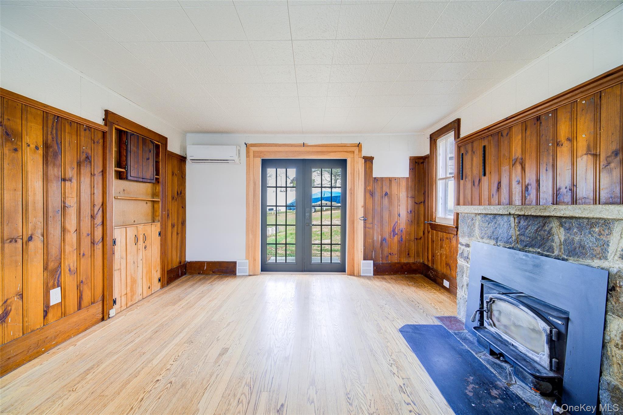 17 Baldwin Road Carmel, NY 10512 - Photo 8 of 29 a view of an empty room with wooden floor and a window