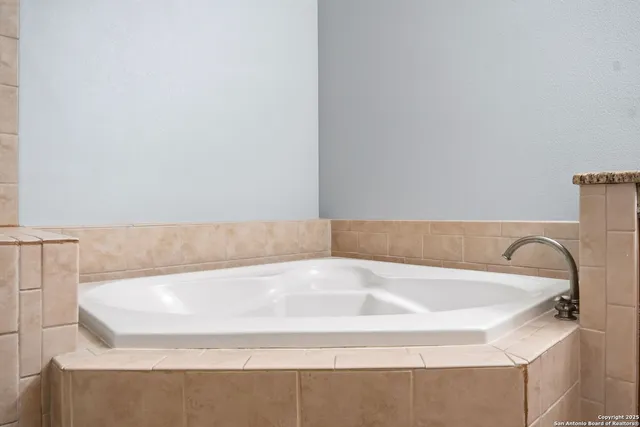 a bathroom with a bathtub