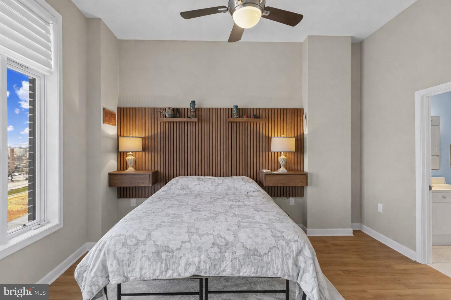 181 East Reed Avenue, Unit 411 Alexandria, VA 22305 - Photo 12 of 24 a bedroom with a bed and a window