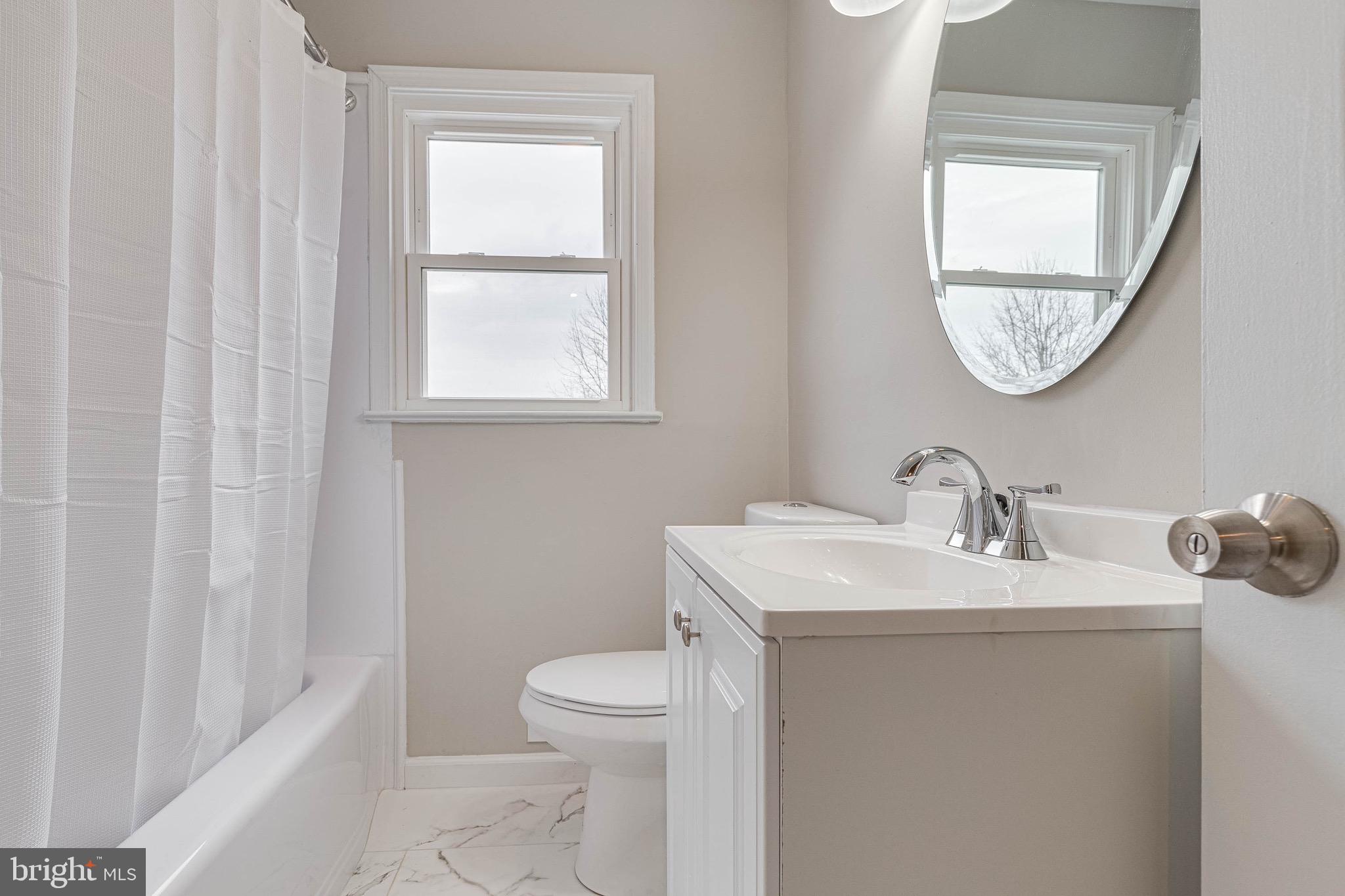 10219 Rodgers Road Fairfax, VA 22030 - Photo 14 of 28 Renovated Full Bathroom on the Main Level