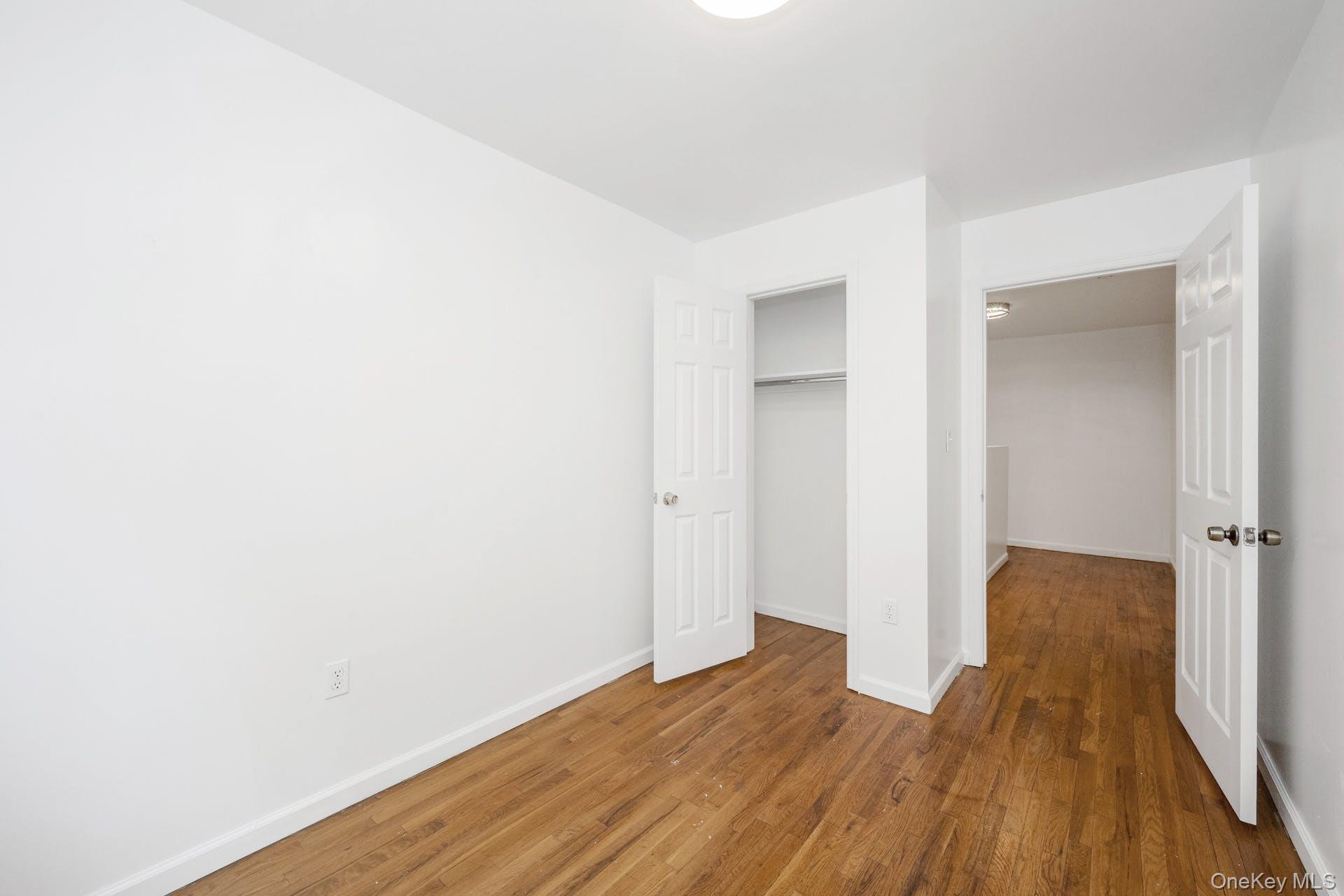 3313 Rombouts Avenue Bronx, NY 10475 - Photo 22 of 44 a view of a room with wooden floor