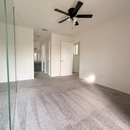 a view of a big room with carpet