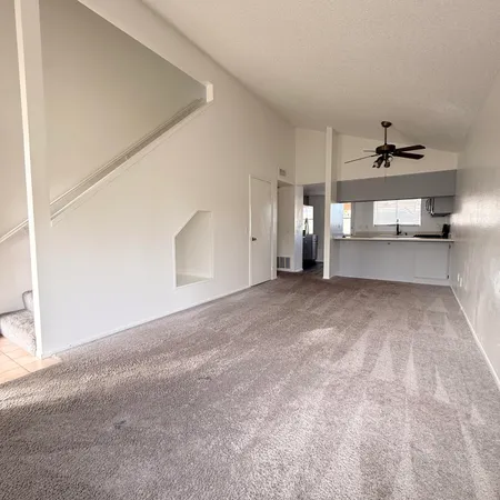 a view of a livingroom with a staircase