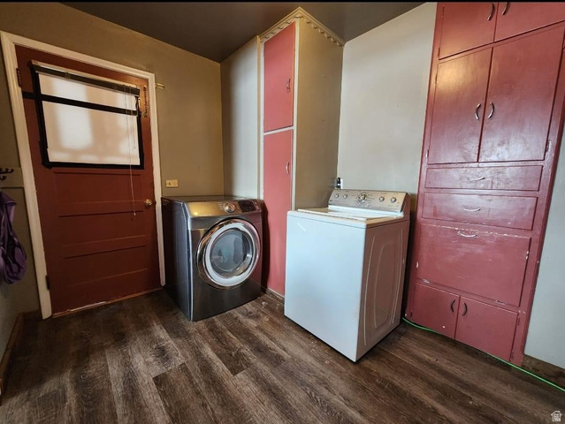 102 South Main Street Paris, ID 83261 - Photo 13 of 33 Laundry room with dark wood finished floors and separate washer and dryer