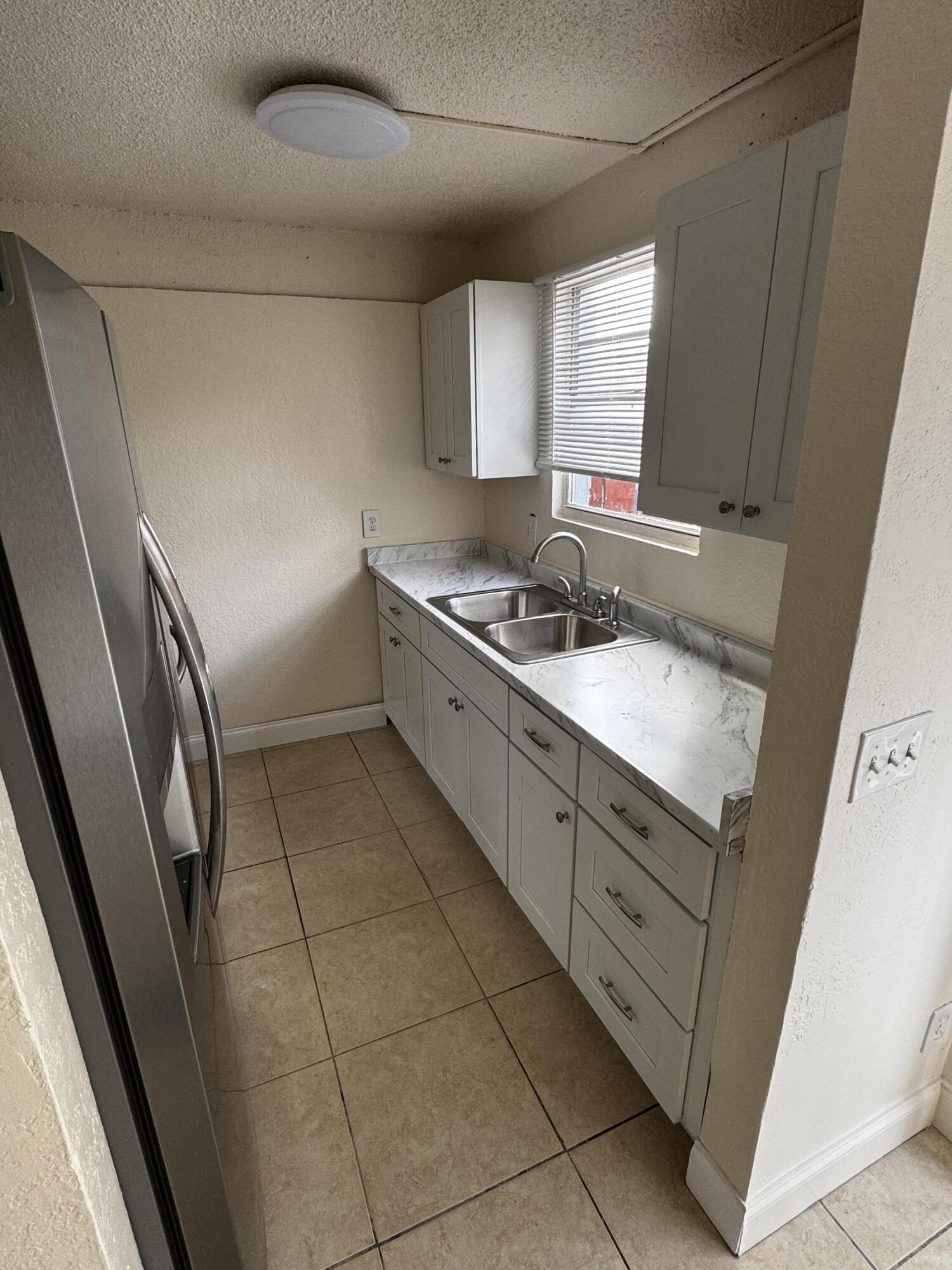 1641 West 27th Street, Unit D Riviera Beach, FL 33404 - Photo 3 of 14 kitchen