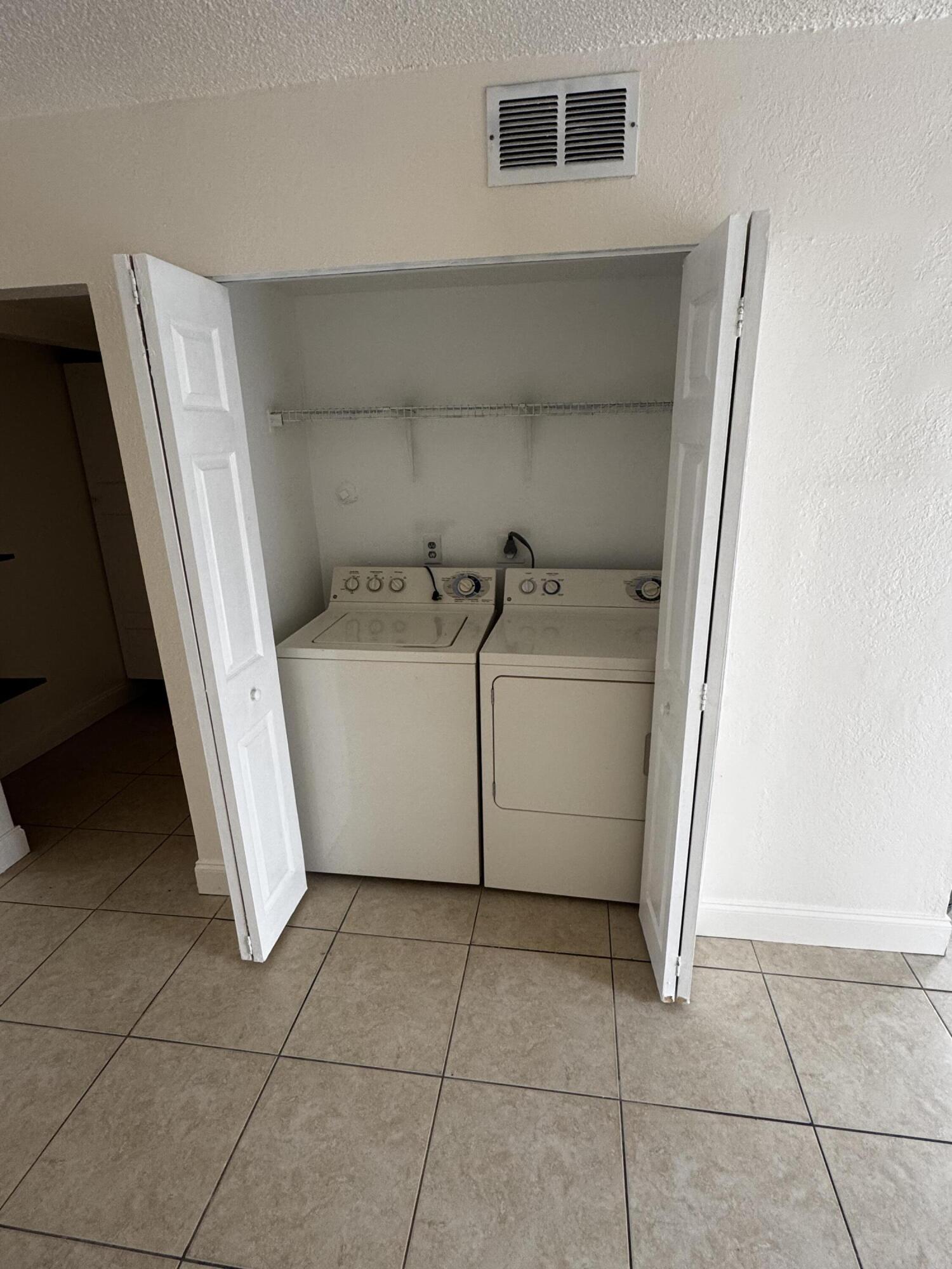 1641 West 27th Street, Unit D Riviera Beach, FL 33404 - Photo 7 of 14 laundry