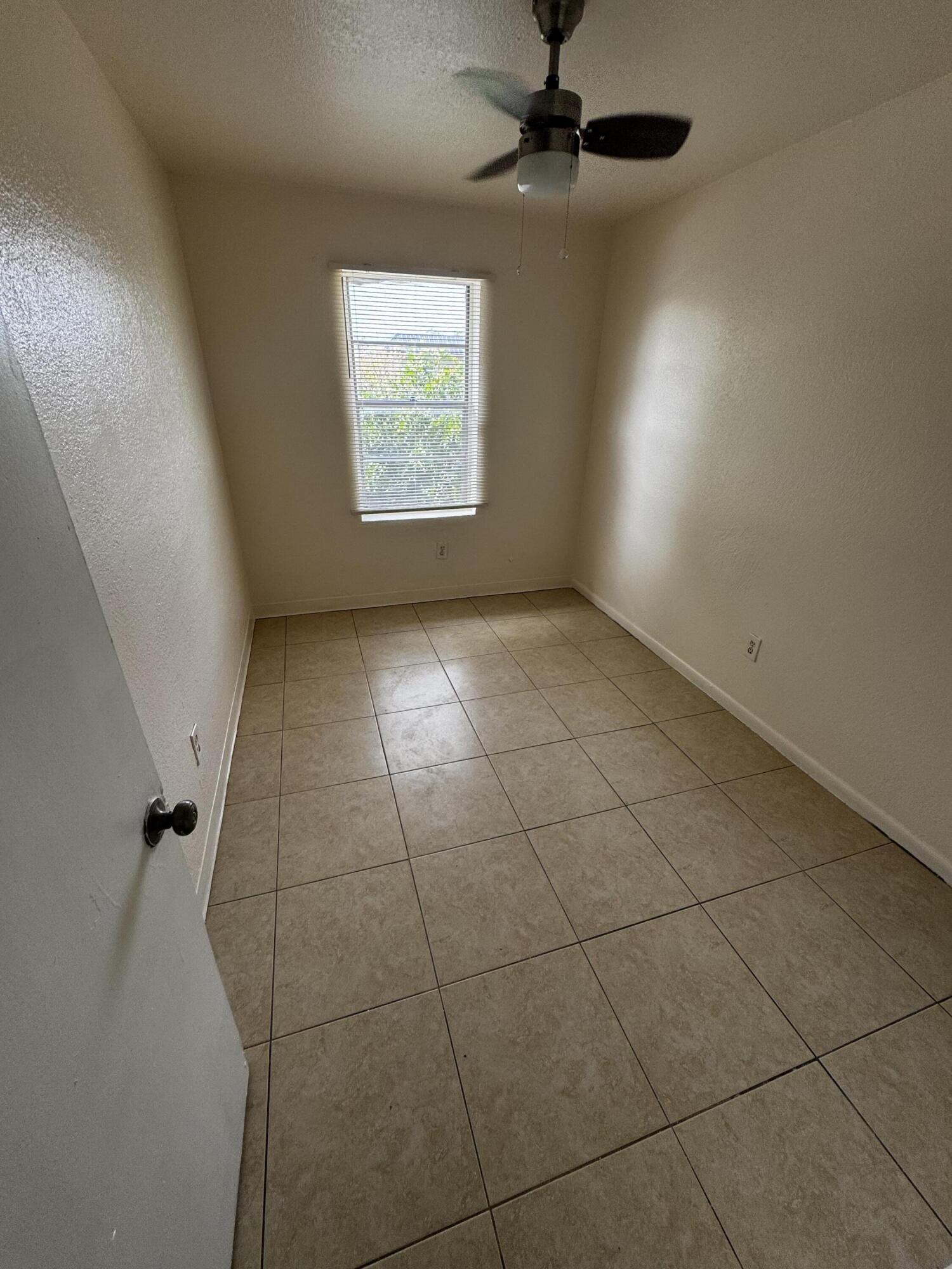 1641 West 27th Street, Unit D Riviera Beach, FL 33404 - Photo 10 of 14 bedroom 2