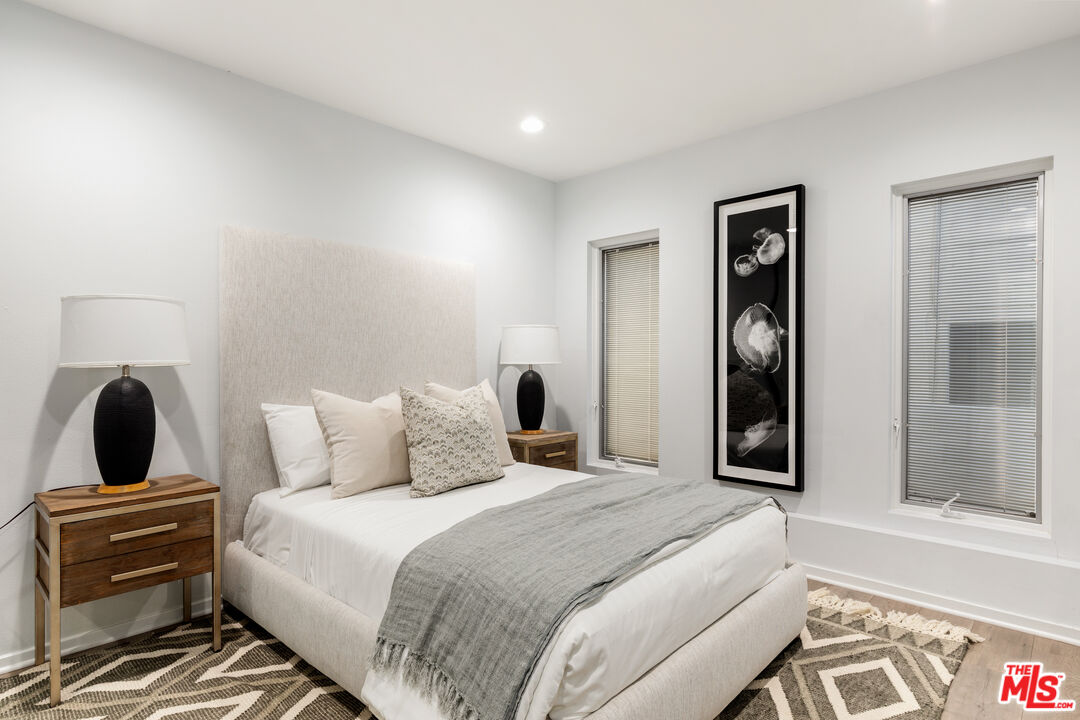 249 Rees Street Playa del Rey, CA 90293 - Photo 29 of 37 a bedroom with a bed and window