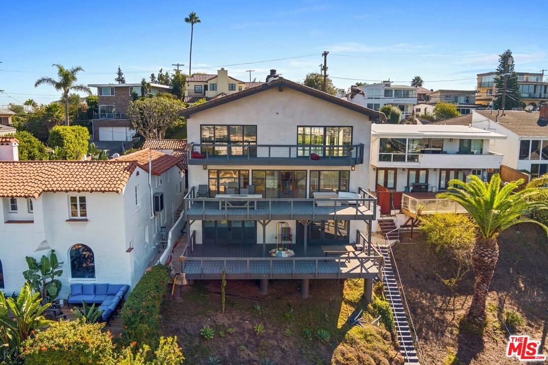 249 Rees Street Playa del Rey, CA 90293 - Photo 31 of 37 a view of multiple houses with a big yard