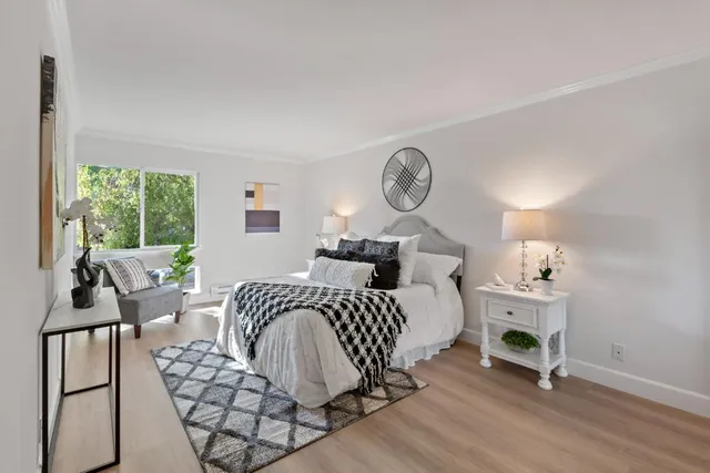 a bathroom with a granite countertop sink a toilet and a mirror