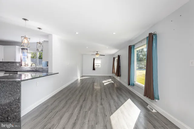 a view of a kitchen from the hallway