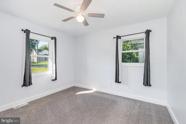 a view of an empty room with window