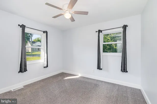 a view of an empty room with window