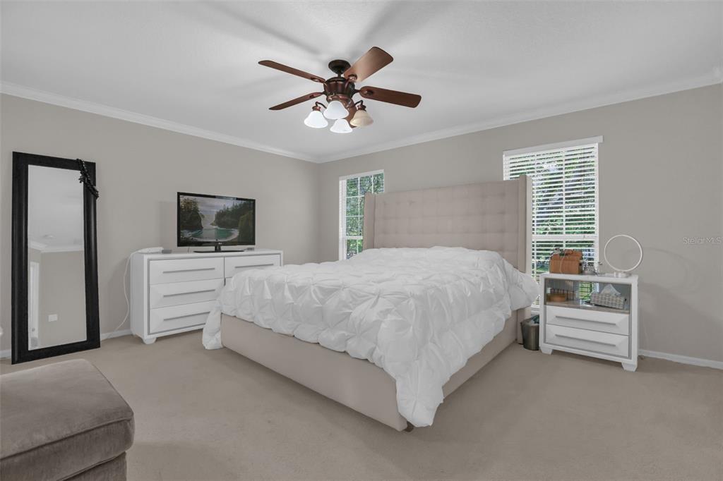 2165 Ridgewood Street Orlando, FL 32803 - Photo 17 of 37 a bed room with a bed and a television