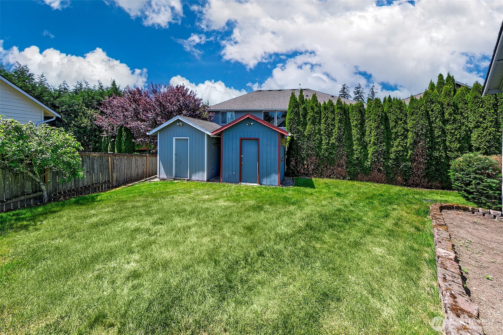 20604 Damson Road Lynnwood, WA 98036 - Photo 21 of 24 front view of a house with a yard