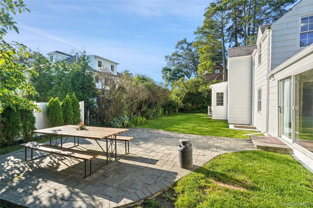 246 Mamaroneck Road Scarsdale, NY 10583 - Photo 9 of 35 View of patio featuring outdoor dining space
