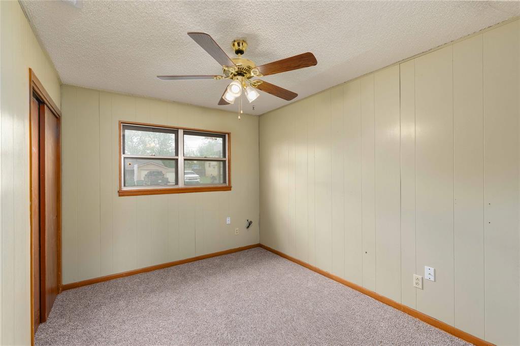 900 West 2nd Street Coleman, TX 76834 - Photo 16 of 28 a view of an empty room with a window