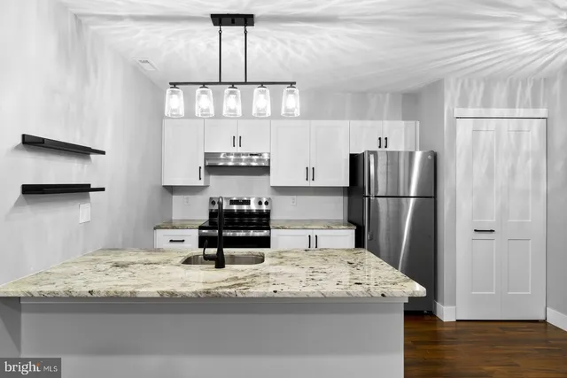 a view of a balcony with wooden floor and fence