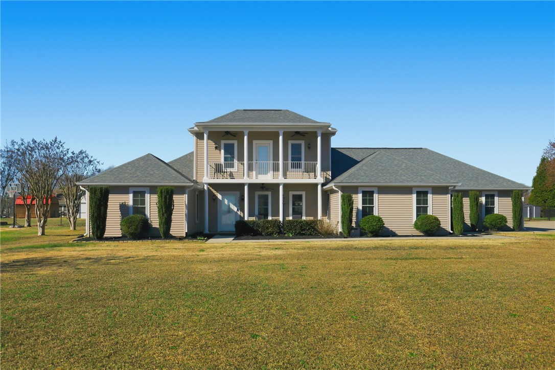 202 C-1-231 Pelzer, SC 29669 - Photo 1 of 49 This grand residence showcases a charming front exterior with a classic porch.