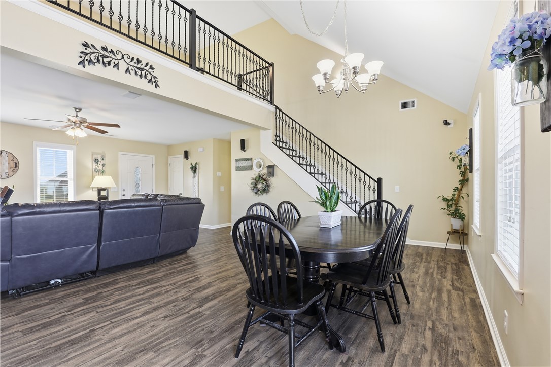 202 C-1-231 Pelzer, SC 29669 - Photo 11 of 49 This inviting space features a dining area that seamlessly connects to the living room and staircase.