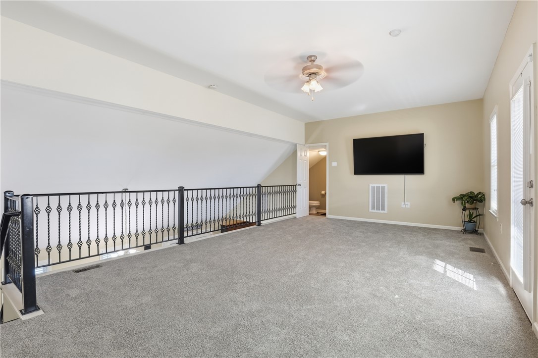 202 C-1-231 Pelzer, SC 29669 - Photo 12 of 49 This versatile loft area offers ample space for recreation and features durable carpeting.